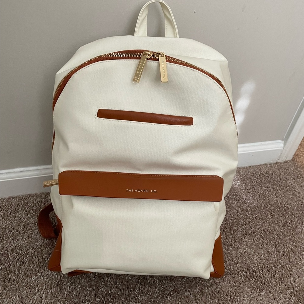Cream diaper bag from honest company. Never used